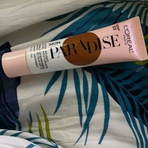 New skin paradise water infuse tinted moisturizer DEEP 03